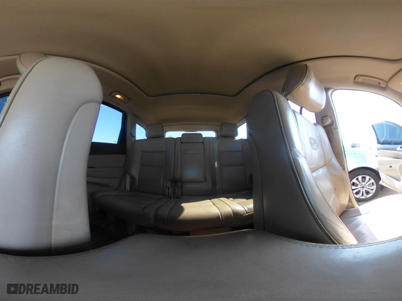 2014 Jeep Grand Cherokee Overland with VIN 1C4RJFCTXEC128443, listed as a IAAI auction lot 40512681 with 126,379 mi miles. Bid and sale history available at carsss.com. Image 19.