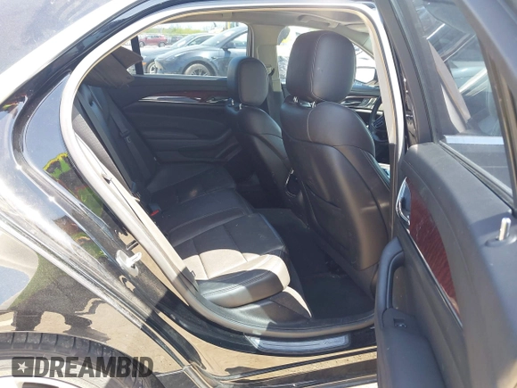 2015 Cadillac CTS RWD with VIN 1G6AP5SX3F0136786, listed as a IAAI auction lot 41992006 with 98,160 mi miles and . Bid and sale history available at DreamBid. Image 8.