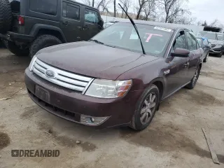 2009 Ford Taurus SEL with VIN 1FAHP24W19G104421, listed as a Copart auction lot 82301983 with 256,008 mi miles and Salvage Title. Bid and sale history available at carsss.com. Image 1.