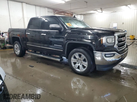 2017 GMC Sierra 1500 SLT z VIN 3GTU2NEC1HG211372, wystawiony jako Copart lot #56509595 z przebiegiem 72 150 mil mil oraz Szkody całkowita. Historia ofert i sprzedaży dostępna na DreamBid. Obrazek 4.