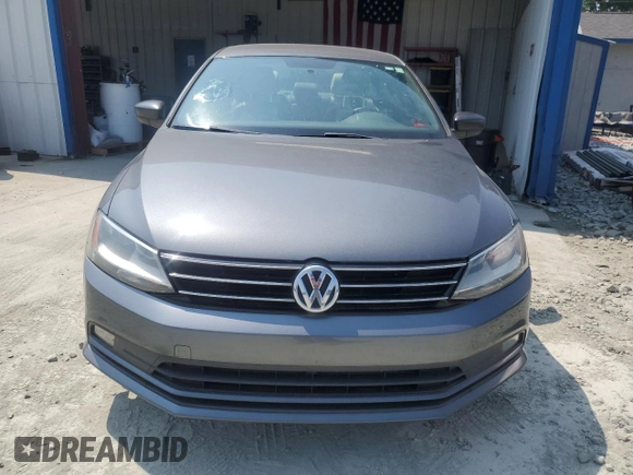 2016 Volkswagen Jetta Sport z VIN 3VWD17AJ4GM300868, wystawiony jako Copart lot #59631225 z przebiegiem 182 871 mil mil oraz Czysty tytuł • Clean title. Historia ofert i sprzedaży dostępna na DreamBid. Obrazek 5.