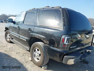 2003 Chevrolet Tahoe LT with VIN 1GNEC13Z13J239642, listed as a IAAI auction lot 41777802 with 1 mi miles. Bid and sale history available at carsss.com. Image 3.