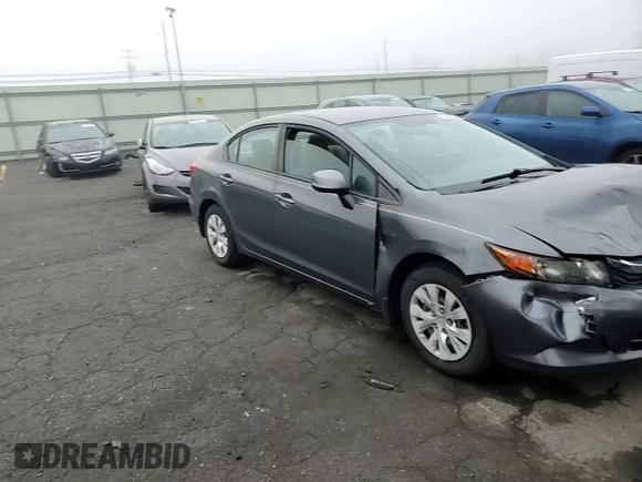 2012 Honda Civic LX z VIN 2HGFB2F50CH324974, wystawiony jako Copart lot #57442305 z przebiegiem 124 462 mil mil oraz Szkoda całkowita • Salvage title. Historia ofert i sprzedaży dostępna na DreamBid. Obrazek 13.