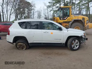 2014 Jeep Compass Sport with VIN 1C4NJCBB9ED547335, listed as a IAAI auction lot 41821726 with 144,100 mi miles and . Bid and sale history available at DreamBid. Image 14.