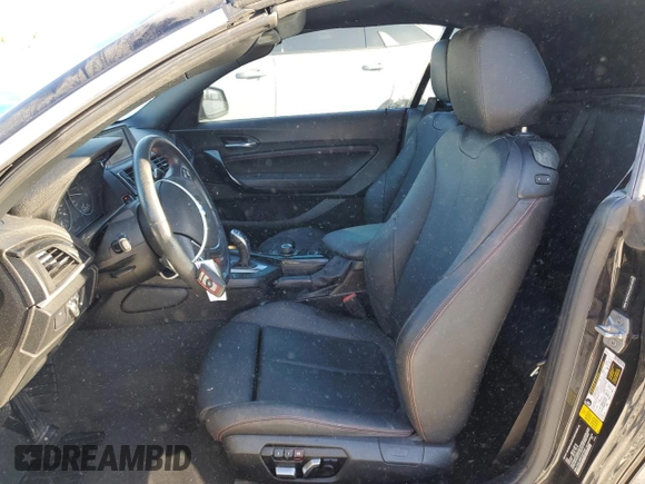 2016 BMW 2 Series 228i with VIN WBA1K9C59GV321555, listed as a Copart auction lot 49504985 with 124,471 mi miles and Salvage Title. Bid and sale history available at carsss.com. Image 7.