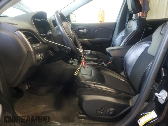 2019 Jeep Cherokee Altitude with VIN 1C4PJMLX5KD386597, listed as a Copart auction lot 59132655 with 129,243 mi miles and Salvage title. Bid and sale history available at DreamBid. Image 7.