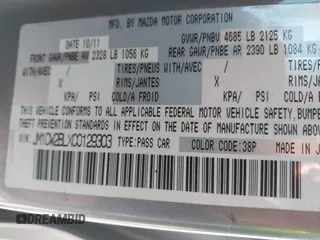2012 Mazda 5 Sport with VIN JM1CW2BLXC0129303, listed as a IAAI auction lot 42556899 with 200,863 mi miles and . Bid and sale history available at DreamBid. Image 9.