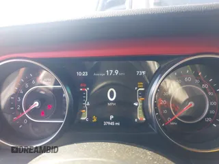 2021 Jeep Gladiator Rubicon z VIN 1C6JJTBG9ML592538, wystawiony jako IAAI lot #42206035 z przebiegiem 37 945 mil mil oraz . Historia ofert i sprzedaży dostępna na DreamBid. Obrazek 7.