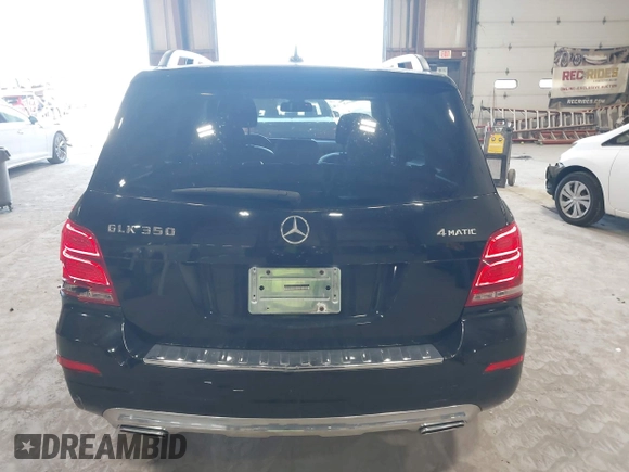 2015 Mercedes-Benz GLK with VIN WDCGG8JB0FG364079, listed as a IAAI auction lot 42096003 with 113,571 mi miles. Bid and sale history available at carsss.com. Image 16.