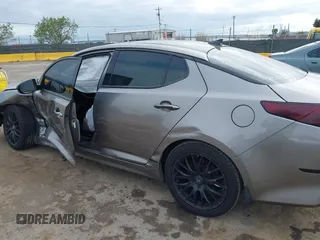 2015 Kia Optima EX with VIN 5XXGN4A7XFG423145, listed as a IAAI auction lot 42068943 with 113,730 mi miles and . Bid and sale history available at DreamBid. Image 17.