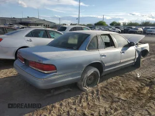 1997 Ford Crown Victoria LX z VIN 2FALP74W1VX206832, wystawiony jako Copart lot #51716425 z przebiegiem 325 063 mil mil oraz Szkoda całkowita • Salvage title. Historia ofert i sprzedaży dostępna na DreamBid. Obrazek 3.