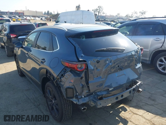 2024 Mazda CX-30 S Carbon Edition z VIN 3MVDMBCM3RM635044, wystawiony jako IAAI lot #41979849 z przebiegiem 15 717 mil mil oraz . Historia ofert i sprzedaży dostępna na DreamBid. Obrazek 3.