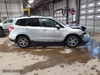 2015 Subaru Forester 2.5i Touring with VIN JF2SJAUCXFH471892, listed as a IAAI auction lot 41314722 with 94,717 mi miles. Bid and sale history available at carsss.com. Image 13.