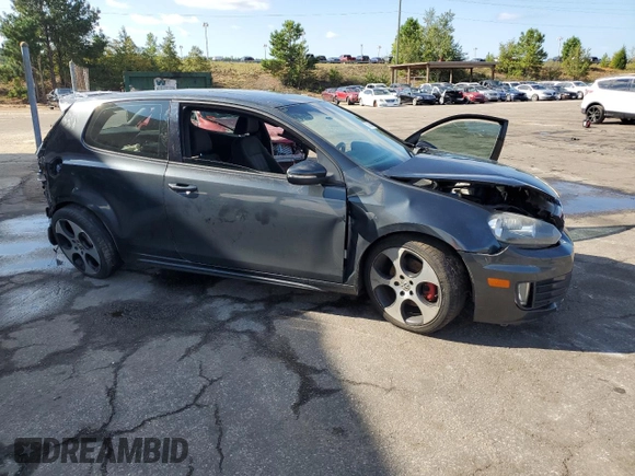 2012 Volkswagen GTI w/Conv & Sunroof с VIN WVWEV7AJ5CW145480, выставлен на аукционе Copart как лот 71466434 с пробегом Не указан миль и Списание • Salvage title. История ставок и продаж доступна на DreamBid. Изображение 4.