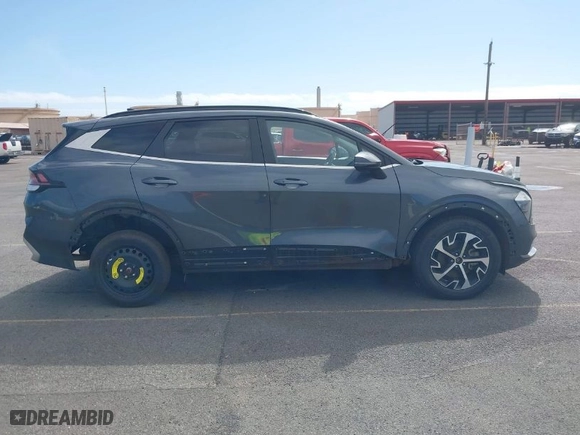 2023 Kia Sportage Hybrid EX with VIN KNDPVCAG5P7020209, listed as a IAAI auction lot 41409698 with 67,953 mi miles. Bid and sale history available at carsss.com. Image 14.