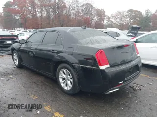 2015 Chrysler 300 Limited with VIN 2C3CCAAG8FH807168, listed as a IAAI auction lot 41056399 with Not Provided miles. Bid and sale history available at carsss.com. Image 3.