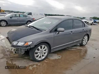2010 Honda Civic LX with VIN 2HGFA1F52AH315977, listed as a Copart auction lot 54240115 with 217,883 mi miles and Salvage Title. Bid and sale history available at DreamBid. Image 1.