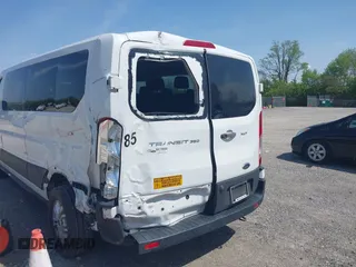 2021 Ford Transit Passenger XL z VIN 1FBAX2Y84MKA14973, wystawiony jako IAAI lot #42149017 z przebiegiem 105 171 mil mil oraz . Historia ofert i sprzedaży dostępna na DreamBid. Obrazek 18.