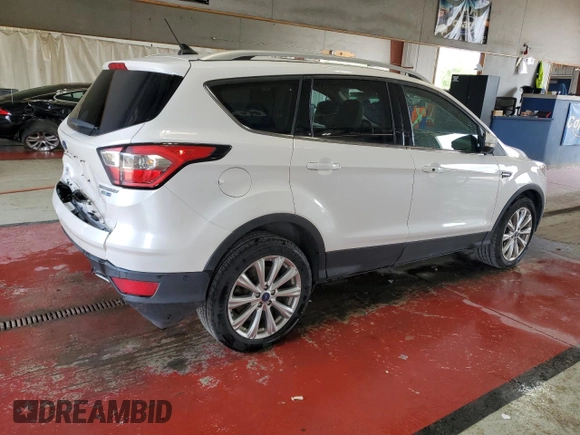 2018 Ford Escape Titanium с VIN 1FMCU9J90JUB30658, выставлен на аукционе Copart как лот 64001665 с пробегом 61 970 миль миль и Списание • Salvage title. История ставок и продаж доступна на DreamBid. Изображение 3.