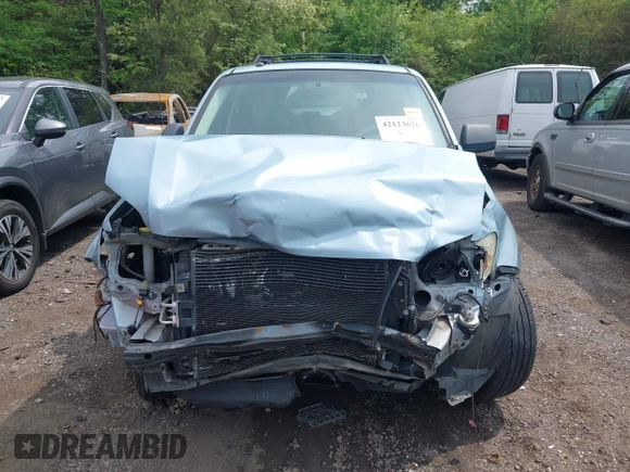 2008 Mercury Mariner with VIN 4M2CU81178KJ28804, listed as a IAAI auction lot 42123626 with 168,134 mi miles and . Bid and sale history available at DreamBid. Image 6.