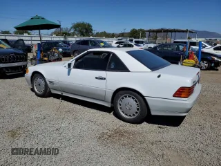 1992 Mercedes-Benz 500 z VIN WDBFA66E7NF049079, wystawiony jako Copart lot #52642285 z przebiegiem 69 976 mil mil oraz Szkody całkowita. Historia ofert i sprzedaży dostępna na DreamBid. Obrazek 2.