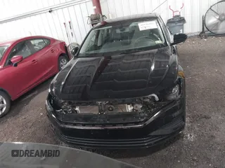 2021 Volkswagen Jetta S z VIN 3VWC57BU4MM009212, wystawiony jako IAAI lot #42136463 z przebiegiem 93 627 mil mil oraz . Historia ofert i sprzedaży dostępna na DreamBid. Obrazek 12.