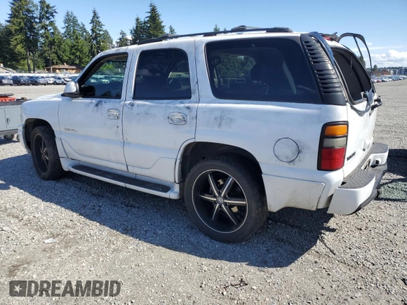 2005 GMC Yukon Denali z VIN 1GKEK63U55J143324, wystawiony jako Copart lot #59000695 z przebiegiem Nie podano mil oraz Szkoda całkowita • Salvage title. Historia ofert i sprzedaży dostępna na DreamBid. Obrazek 2.