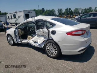 2015 Ford Fusion SE Hybrid z VIN 3FA6P0LU8FR105615, wystawiony jako Copart lot #61451155 z przebiegiem 106 778 mil mil oraz Szkoda całkowita • Salvage title. Historia ofert i sprzedaży dostępna na DreamBid. Obrazek 2.