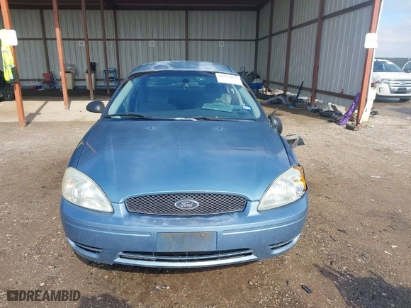 2005 Ford Taurus SE with VIN 1FAFP53U45A176669, listed as a IAAI auction lot 41357877 with 209392 miles. Bid and sale history available at carsss.com. Image 12.