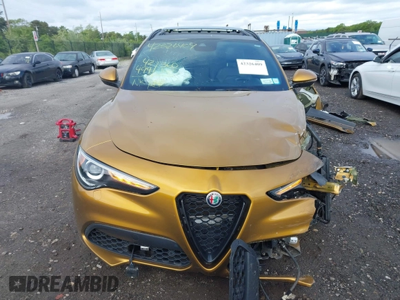 2022 Alfa Romeo Stelvio Veloce z VIN ZASPAKBNXN7D26328, wystawiony jako IAAI lot #42326409 z przebiegiem 42 494 mil mil oraz . Historia ofert i sprzedaży dostępna na DreamBid. Obrazek 12.