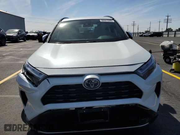 2024 Toyota RAV4 Hybrid SE z VIN 2T3T6RFV6RW049747, wystawiony jako Copart lot #58441525 z przebiegiem 10 458 mil mil oraz Szkoda całkowita • Salvage title. Historia ofert i sprzedaży dostępna na DreamBid. Obrazek 5.