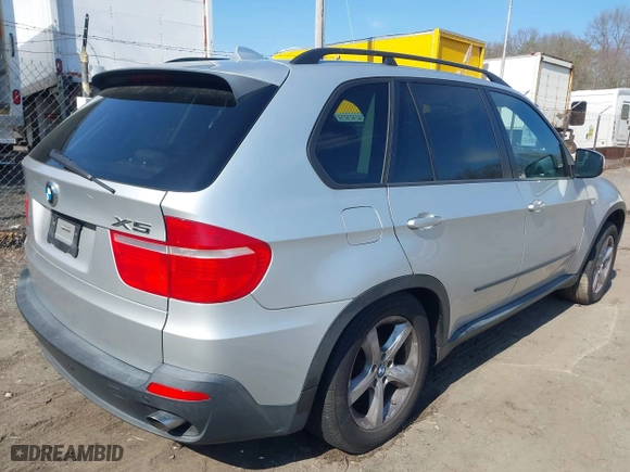 2009 BMW X5 30i with VIN 5UXFE435X9L272544, listed as a IAAI auction lot 42017376 with 118,793 mi miles. Bid and sale history available at carsss.com. Image 4.