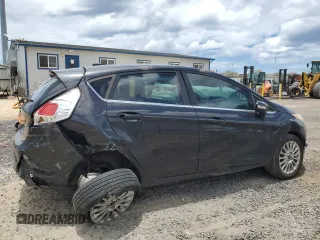 2014 Ford Fiesta Titanium z VIN 3FADP4FJXEM228098, wystawiony jako Copart lot #55173975 z przebiegiem 109 311 mil mil oraz Szkoda całkowita • Salvage title. Historia ofert i sprzedaży dostępna na DreamBid. Obrazek 3.