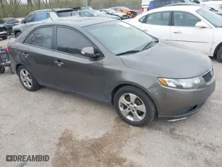 2010 Kia Forte EX with VIN KNAFU4A26A5287755, listed as a IAAI auction lot 41983578 with 273,765 mi miles. Bid and sale history available at carsss.com. Image 1.
