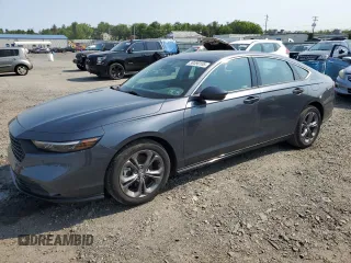 2023 Honda Accord EX-L with VIN 1HGCY2F69PA025806, listed as a Copart auction lot 59390105 with 16,595 mi miles and Salvage title. Bid and sale history available at DreamBid. Image 1.