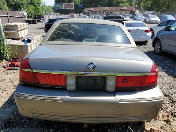 2000 Mercury Grand Marquis LS z VIN 2MEFM75W7YX694301, wystawiony jako Copart lot #57225295 z przebiegiem 141 420 mil mil oraz Szkoda całkowita • Salvage title. Historia ofert i sprzedaży dostępna na DreamBid. Obrazek 6.