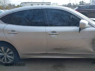 2013 Infiniti M z VIN JN1BY1AR0DM600278, wystawiony jako IAAI lot #41303485 z przebiegiem 298 943 mil mil oraz . Historia ofert i sprzedaży dostępna na DreamBid. Obrazek 13.