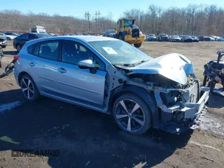 2018 Subaru Impreza Special Sports z VIN 4S3GTAK69J3735458, wystawiony jako IAAI lot #41599640 z przebiegiem 40 719 mil mil oraz . Historia ofert i sprzedaży dostępna na DreamBid. Obrazek 1.