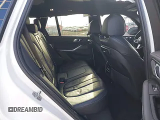 2021 BMW X5 sDrive40i with VIN 5UXCR4C00M9D80482, listed as a IAAI auction lot 41636009 with 85,103 mi miles. Bid and sale history available at carsss.com. Image 8.