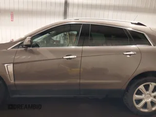 2014 Cadillac SRX Performance Collection z VIN 3GYFNFE38ES578066, wystawiony jako IAAI lot #42153023 z przebiegiem 134 009 mil mil oraz . Historia ofert i sprzedaży dostępna na DreamBid. Obrazek 15.