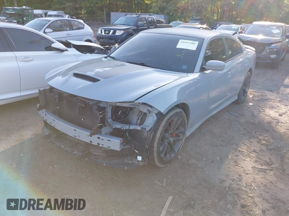2021 Dodge Charger R/T with VIN 2C3CDXCT8MH594715, listed as a IAAI auction lot 42257288 with 11,570 mi miles and . Bid and sale history available at DreamBid. Image 6.