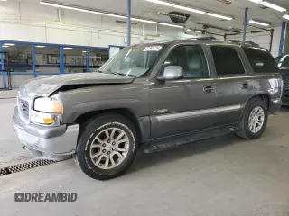 2000 GMC Yukon SLE z VIN 1GKEC13T2YJ128176, wystawiony jako Copart lot #57868425 z przebiegiem 219 559 mil mil oraz Szkoda całkowita • Salvage title. Historia ofert i sprzedaży dostępna na DreamBid. Obrazek 1.