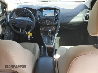 2017 Ford Focus Titanium with VIN 1FADP3J22HL279854, listed as a Copart auction lot 61209135 with 106,323 mi miles and Salvage title. Bid and sale history available at DreamBid. Image 8.