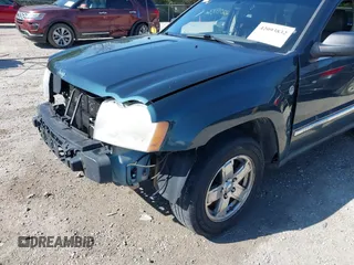 2006 Jeep Grand Cherokee Limited with VIN 1J4HR58NX6C114451, listed as a IAAI auction lot 42093832 with 264,418 mi miles. Bid and sale history available at carsss.com. Image 18.