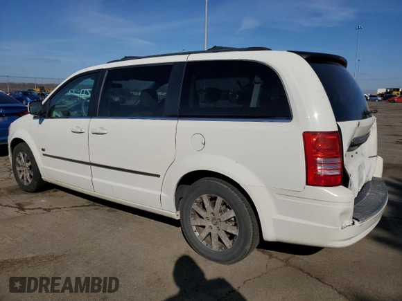 2009 Chrysler Town & Country Touring with VIN 2A8HR54XX9R675671, listed as a Copart auction lot 43807405 with 110,504 mi miles and Salvage Title. Bid and sale history available at DreamBid. Image 2.