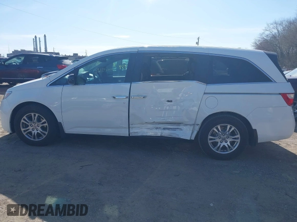 2011 Honda Odyssey EX-L with VIN 5FNRL5H69BB062666, listed as a IAAI auction lot 41829319 with 152,105 mi miles and . Bid and sale history available at carsss.com. Image 14.