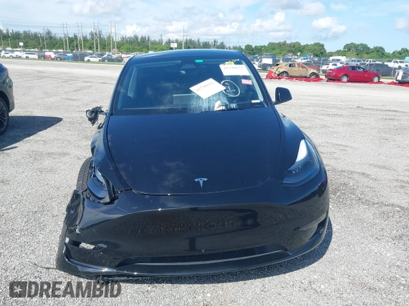 2024 Tesla Model Y z VIN 7SAYGDED6RF191135, wystawiony jako IAAI lot #41790922 z przebiegiem 17 154 mil mil oraz . Historia ofert i sprzedaży dostępna na DreamBid. Obrazek 12.