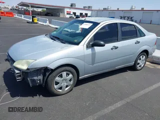 2007 Ford Focus S z VIN 1FAHP34NX7W163158, wystawiony jako IAAI lot #42586421 z przebiegiem 123 131 mil mil oraz . Historia ofert i sprzedaży dostępna na DreamBid. Obrazek 14.