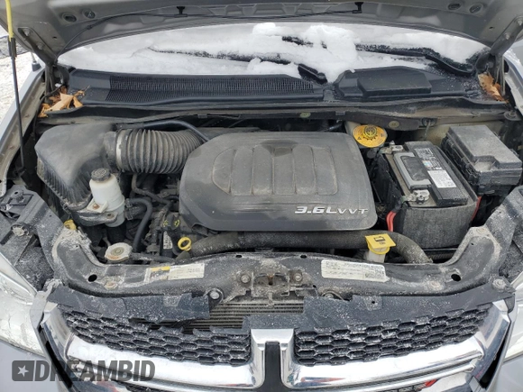 2016 Dodge Grand Caravan SE Plus with VIN 2C4RDGBG6GR332023, listed as a Copart auction lot 46459625 with 121,668 mi miles and Clean title. Bid and sale history available at DreamBid. Image 12.