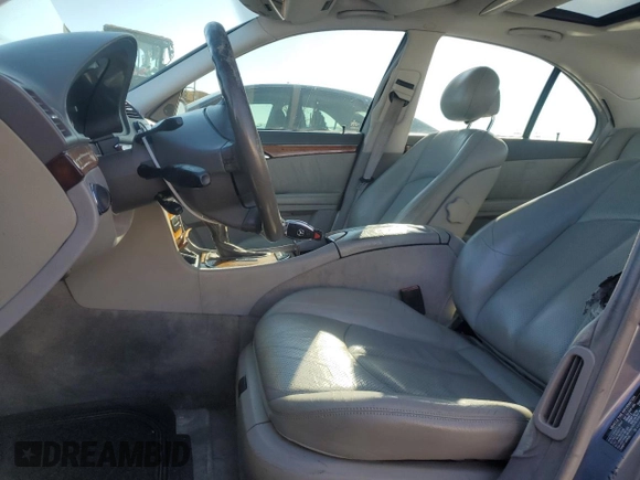 2003 Mercedes-Benz E-Class 5.0L with VIN WDBUF70J93A160425, listed as a Copart auction lot 85186494 with 185,348 mi miles and Salvage Title. Bid and sale history available at carsss.com. Image 7.